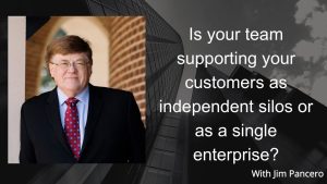 Graphic showing Jim Pancero in an archway with the text, "Is your team supporting your customers as independent silos or as a single enterprise?" to the right.